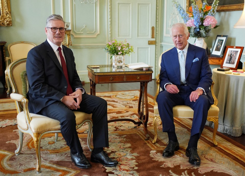 Britain's King Charles talks with Sir Keir Starmer during an audience at Buckingham Palace, where he invited the leader of the Labour Party to become Prime Minister and form a new government following the landslide General Election victory for the Labour Party, London, Britain, July 5, 2024. Yui Mok/POOL via REUTERS TPX IMAGES OF THE DAY