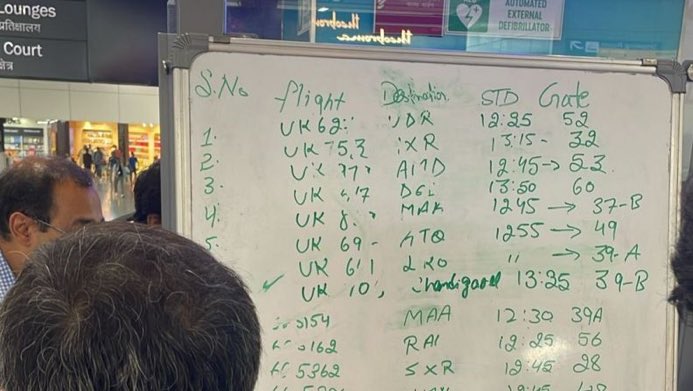 Manchester Airport resorted to using whiteboards to display flight information on Friday