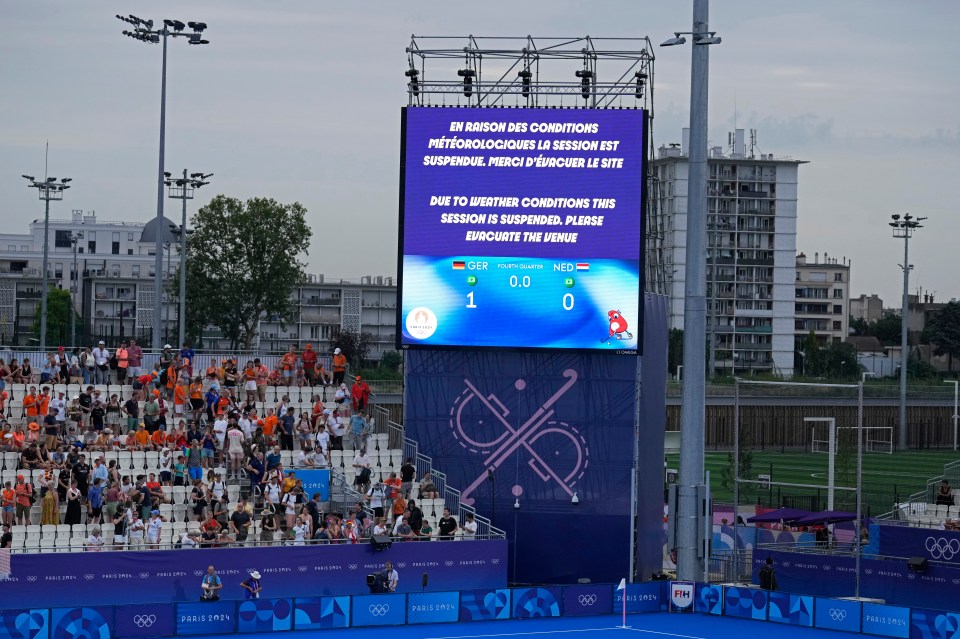 a scoreboard displays the score of a tennis match