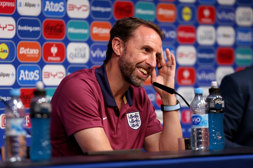 a man wearing a shirt that says england on it