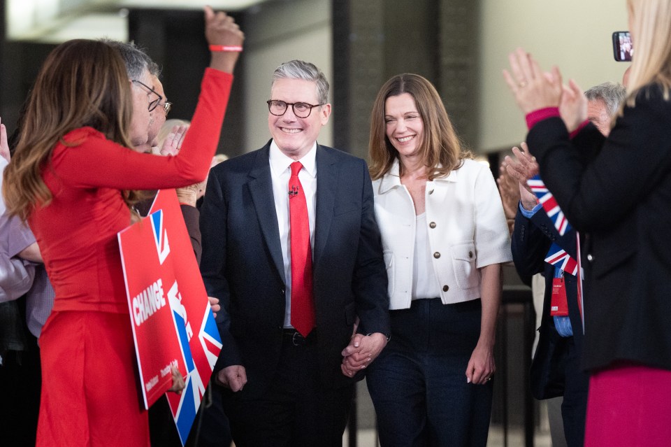 Sir Keir Starmer and Victoria are cheered at an overnight watch party