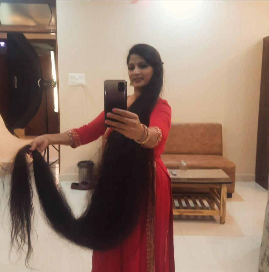 Washing and styling her hair can take up to three hours