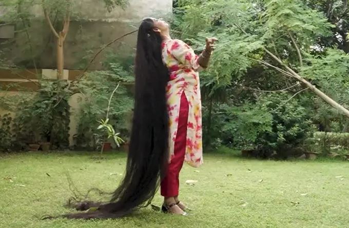 Even though she's claimed the title, she doesn't intend to stop growing her tresses