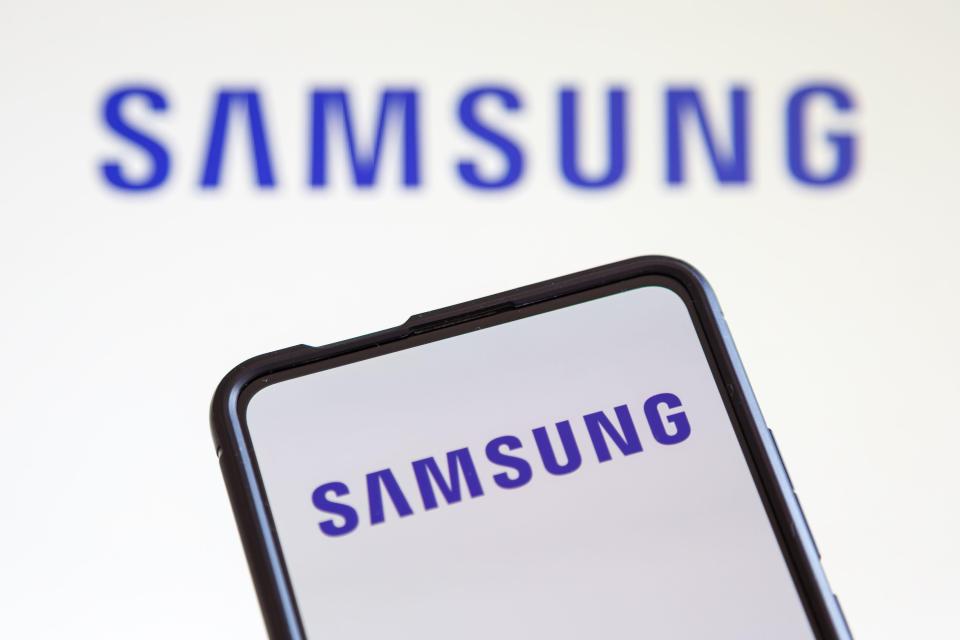 a phone with the samsung logo on the screen