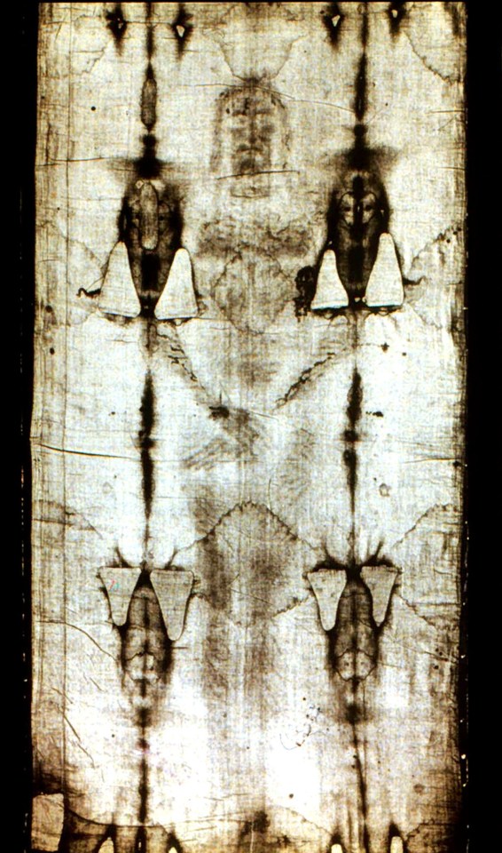 a close up of a piece of cloth with a face on it