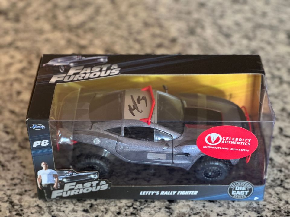 a fast and furious toy car in a box