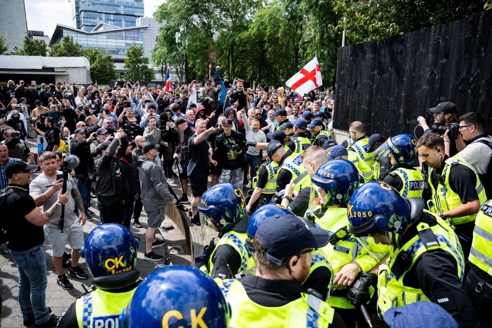 Protestors clash with police and counter protestors in Manchester