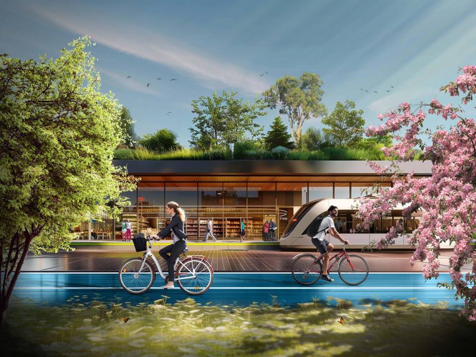 a woman riding a bike in front of a building with a green roof