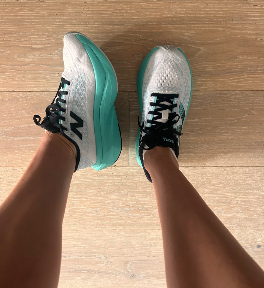 a person wearing a pair of new balance shoes