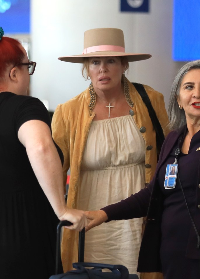She wore a bohemian outfit which she styled with a fedora