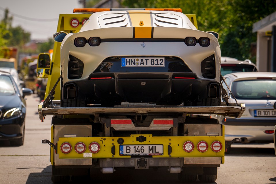 a tow truck has a license plate that says b 146 mil