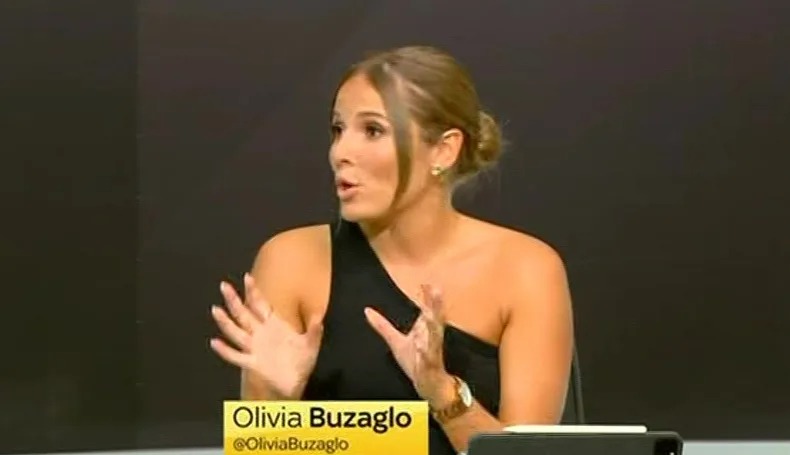 a woman is sitting in front of a screen that says good morning transfers