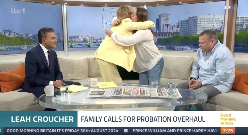 a group of people sitting on a couch in front of a screen that says good morning britain