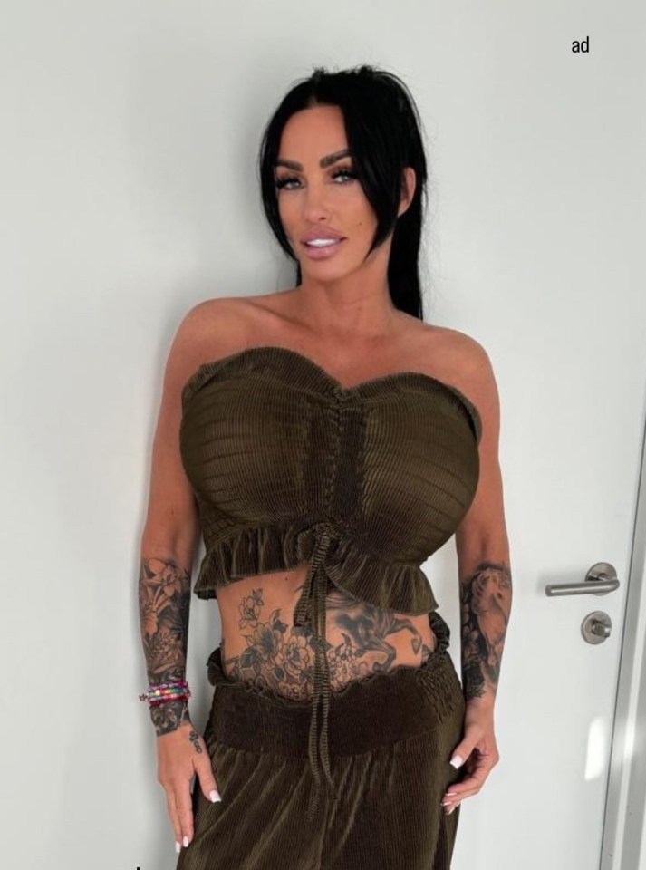 a woman with a lot of tattoos on her arms and chest