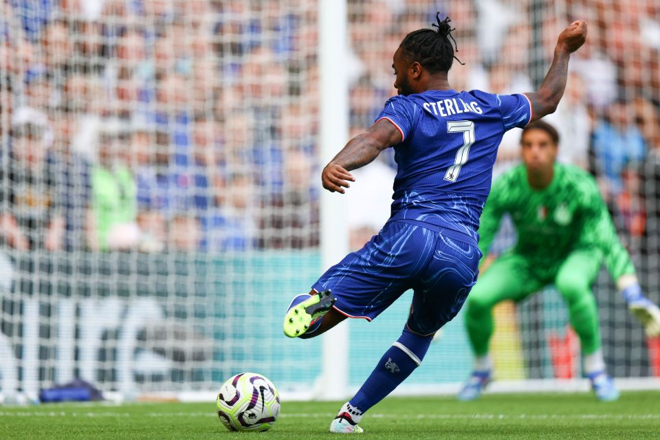 a soccer player with the name sterling on the back of his jersey