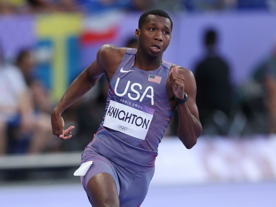 a runner with the name usa knighton on his shirt