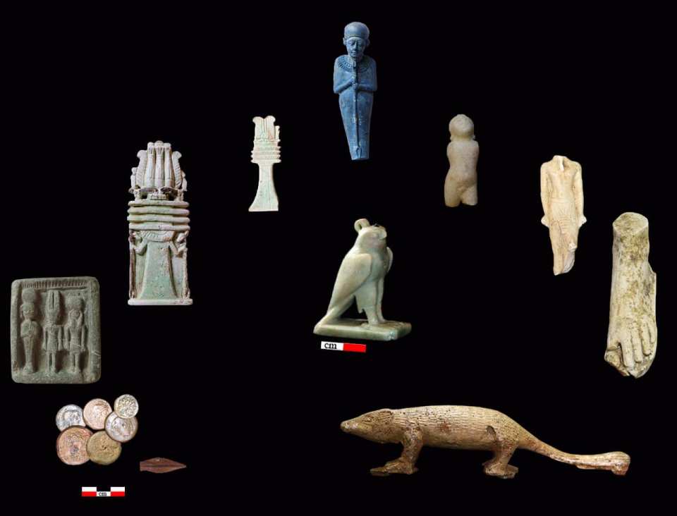 a collection of ancient egyptian artifacts including a statue of an owl