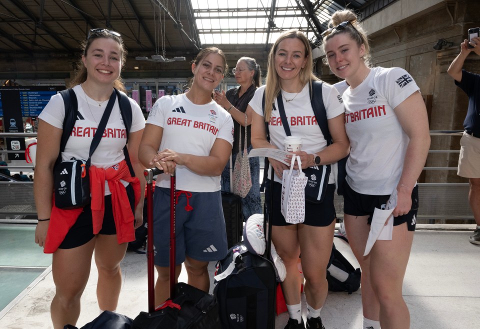 four women wearing white shirts that say great britain