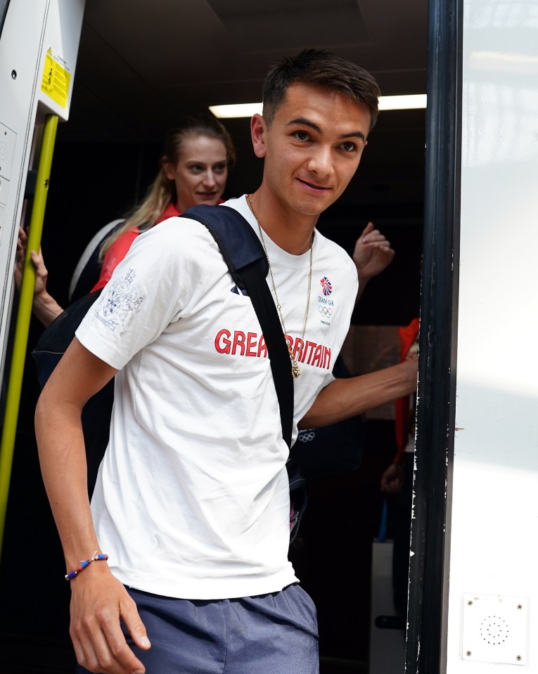 a man wearing a shirt that says great britain on it