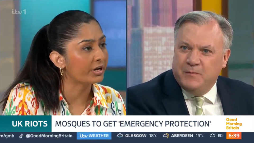 a man and a woman are on a tv show called good morning britain