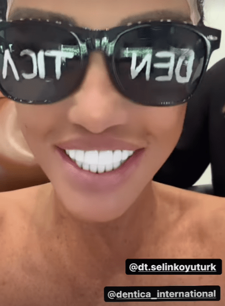 a woman wearing sunglasses with the word lucky written on them