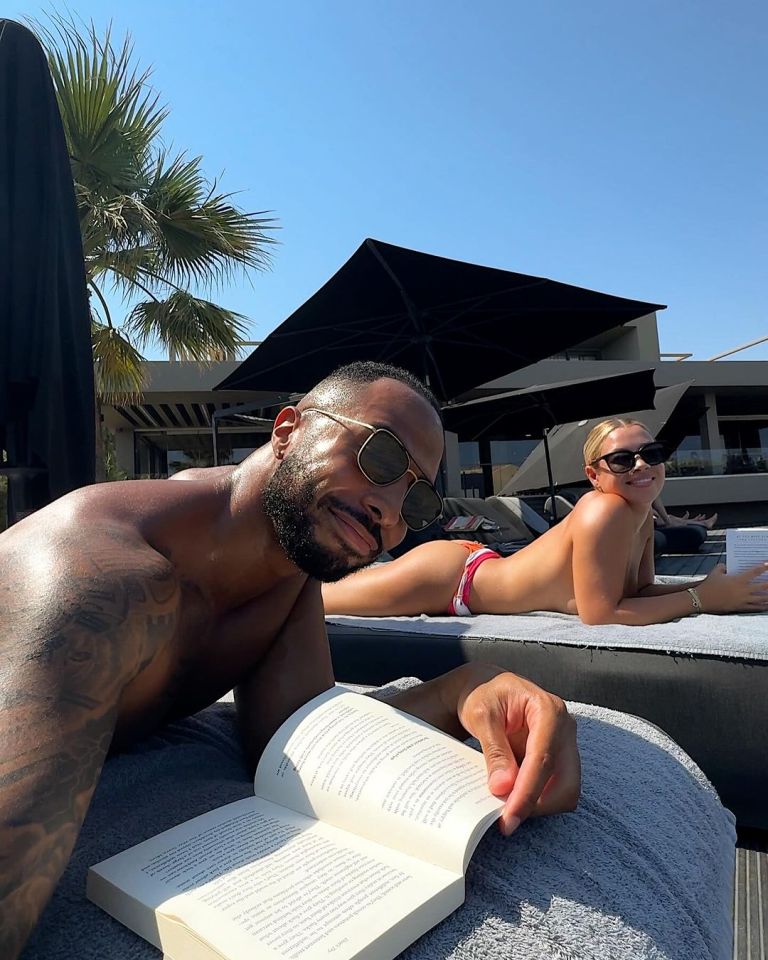 Molly Rainford sunbathed topless with her boyfriend Tyler West on holiday
