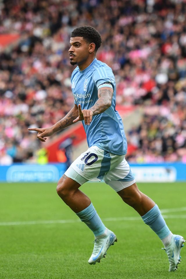 a soccer player with the number 10 on his shorts