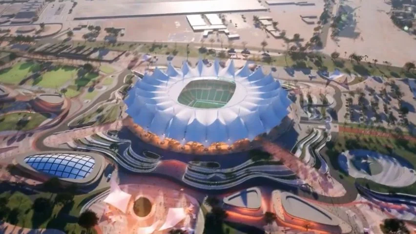 Aerial view of a futuristic World Cup stadium.
