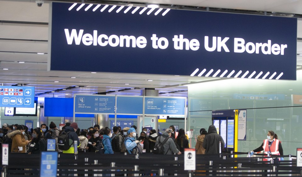 a blue sign that says welcome to the uk border