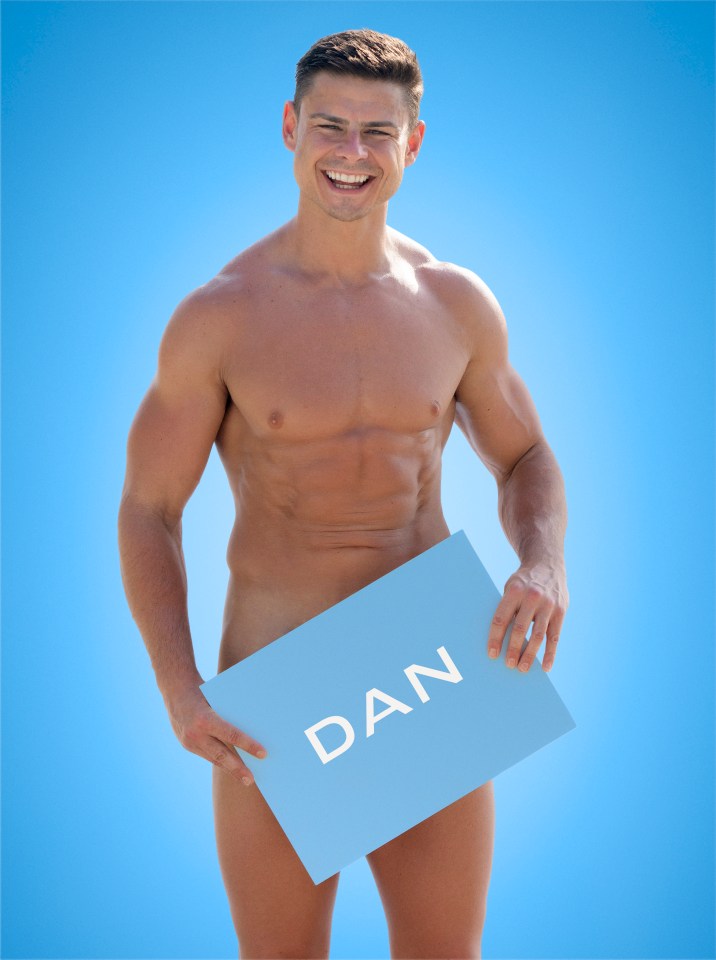 a shirtless man holding a sign that says dan