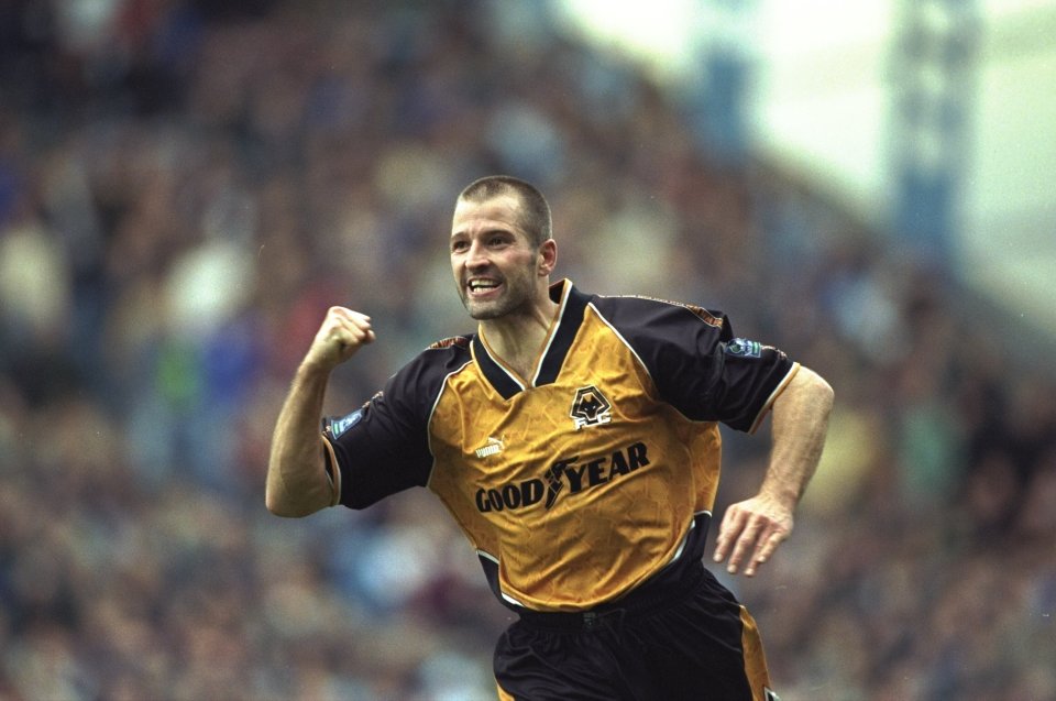 a soccer player wearing a good year jersey celebrates
