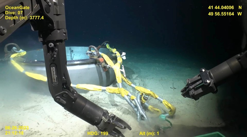 a robotic arm with the word oceangate on it