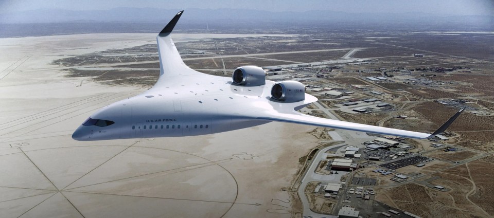 a u.s. air force plane is flying over a desert