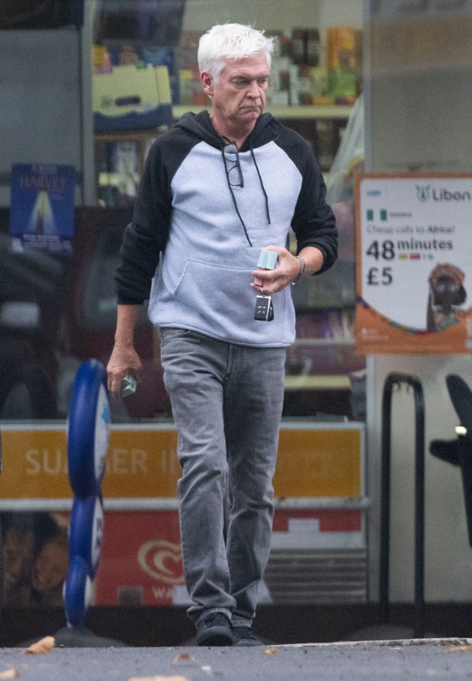 a man walking in front of a sign that says 48 minutes