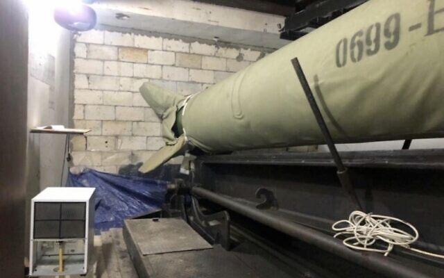 a large green object with the number 0699 on it