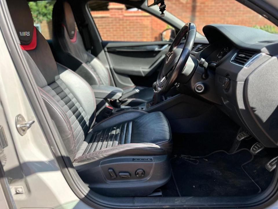 a car with the word rs on the seat