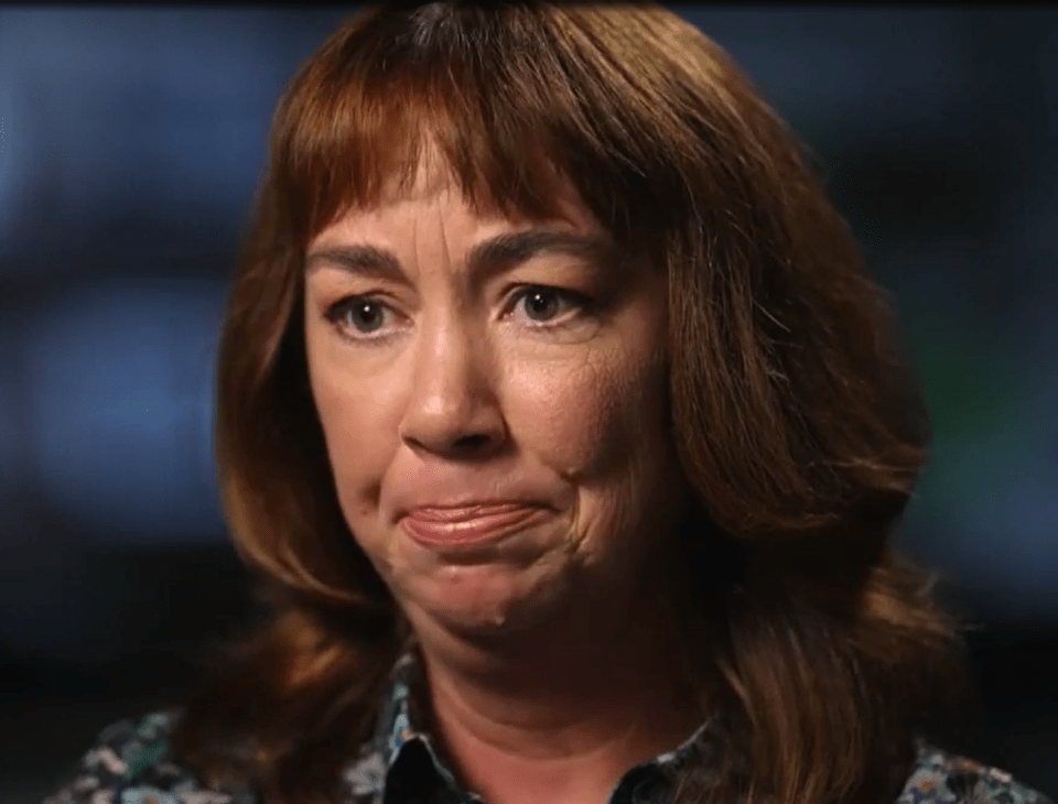 a close up of a woman making a funny face