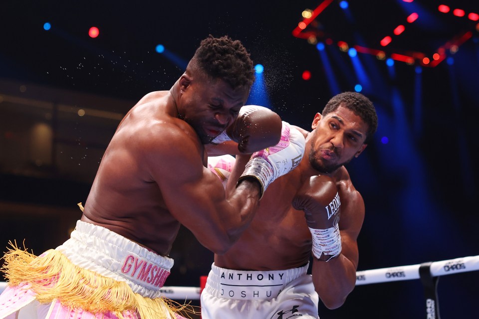 two boxers in a ring with one wearing gymshark shorts