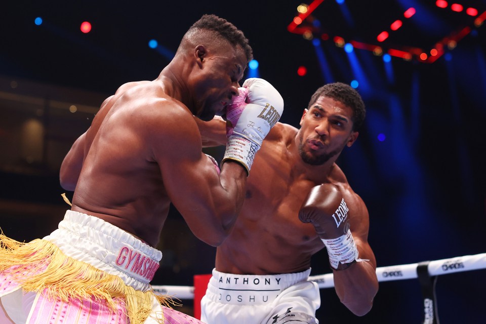 two boxers in a ring with one wearing gymshark shorts