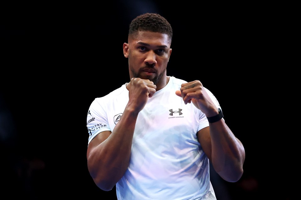 a man wearing a white under armour shirt