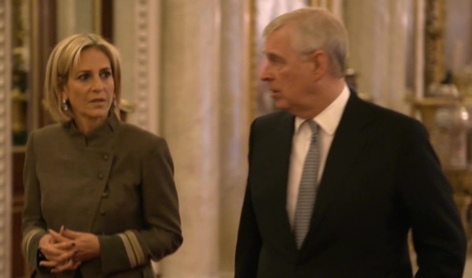 a man and a woman are standing next to each other