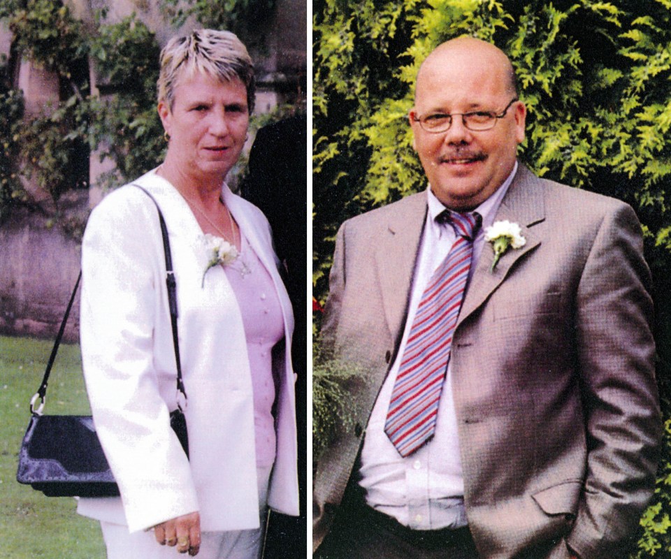 a man in a suit and tie stands next to a woman in a white jacket