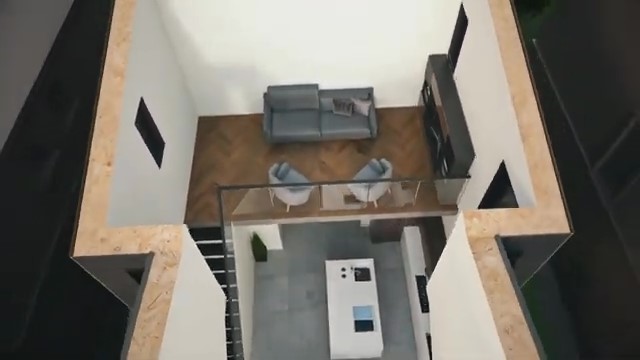 an aerial view of a living room with a couch and chairs