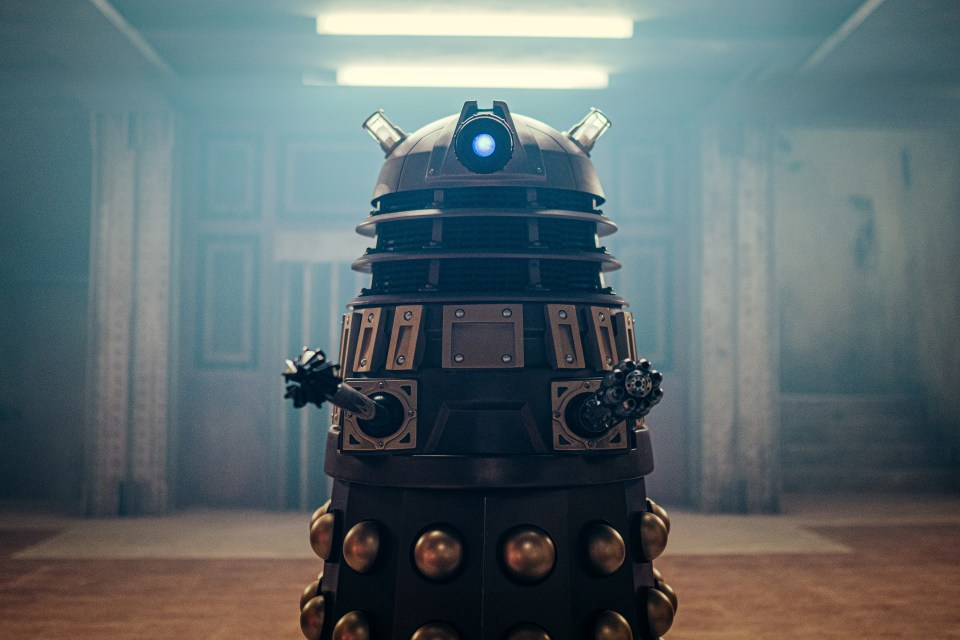 a robot with a blue light on its head
