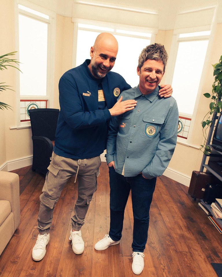 a man in a blue puma sweatshirt stands next to another man