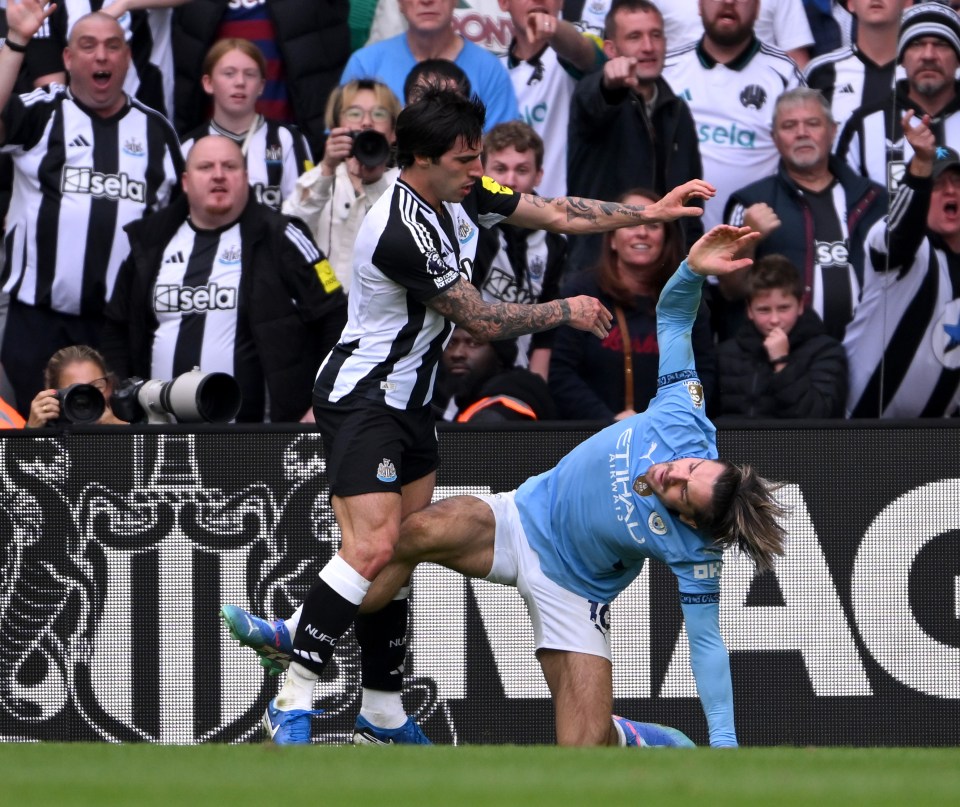 a soccer player with the word etihad on his shorts