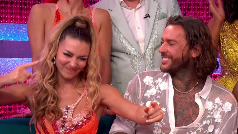 a man and a woman are sitting next to each other