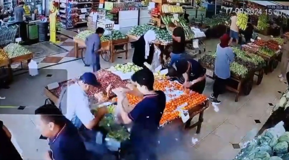 a group of people in a grocery store with the date 17-09-2024