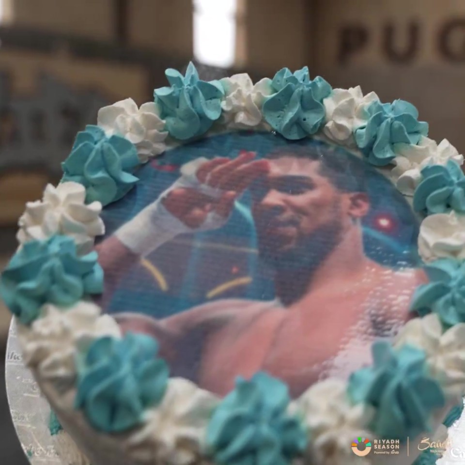 a cake with a picture of a boxer on it