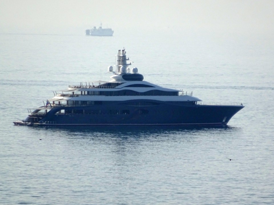 a large yacht is in the middle of the ocean